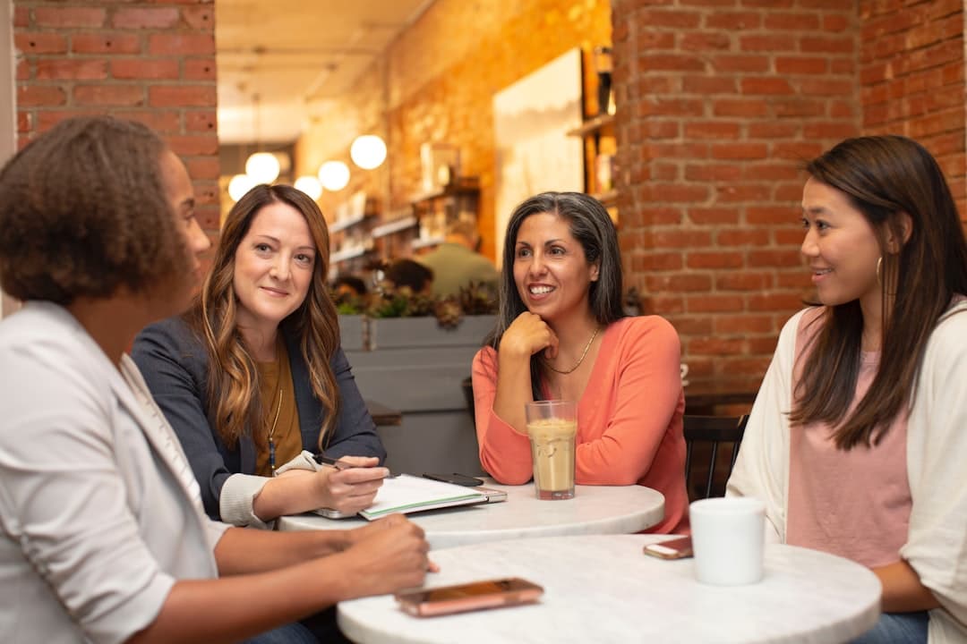 Members meeting to talk through their work